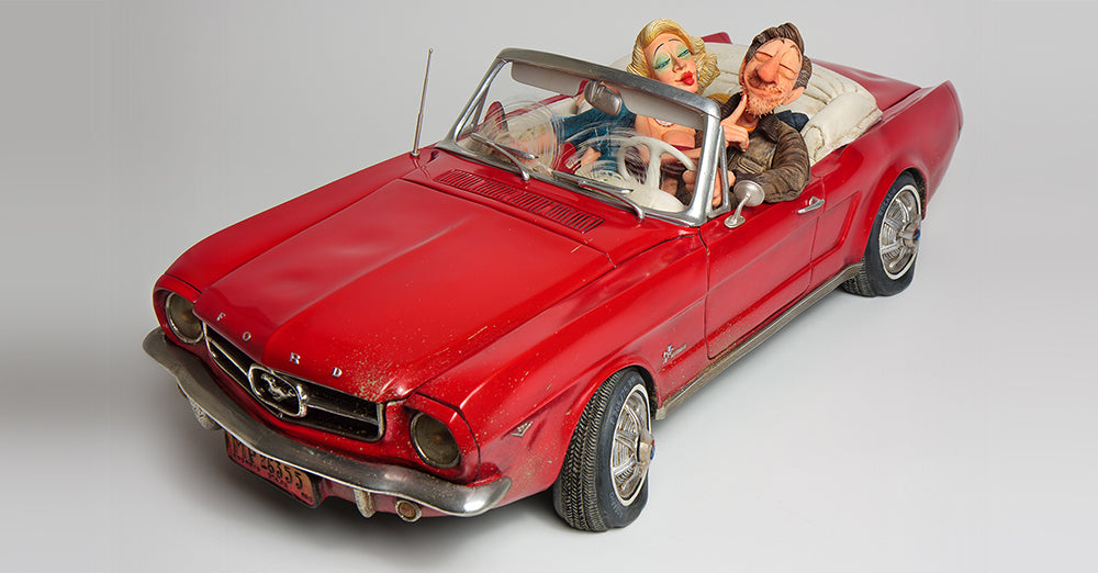 Guillermo Forchino sculpture of a red 65 Ford Mustang with flat tires
