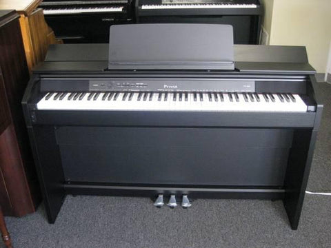 roland kr 575 digital piano price