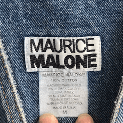Label of vintage Maurice Malone denim overalls made in the USA