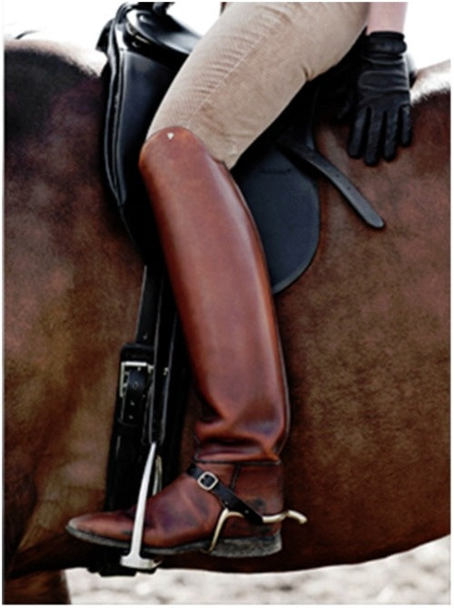 Rider on horse with riding boots, Treccani Milano blog post