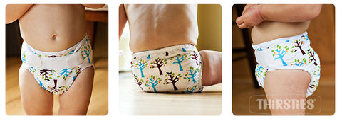 Thirsties One Size Pocket Diaper shown on baby, in blackbird print