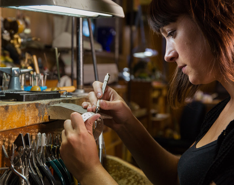 Diana Vincent Process showing jeweler working on bracelet
