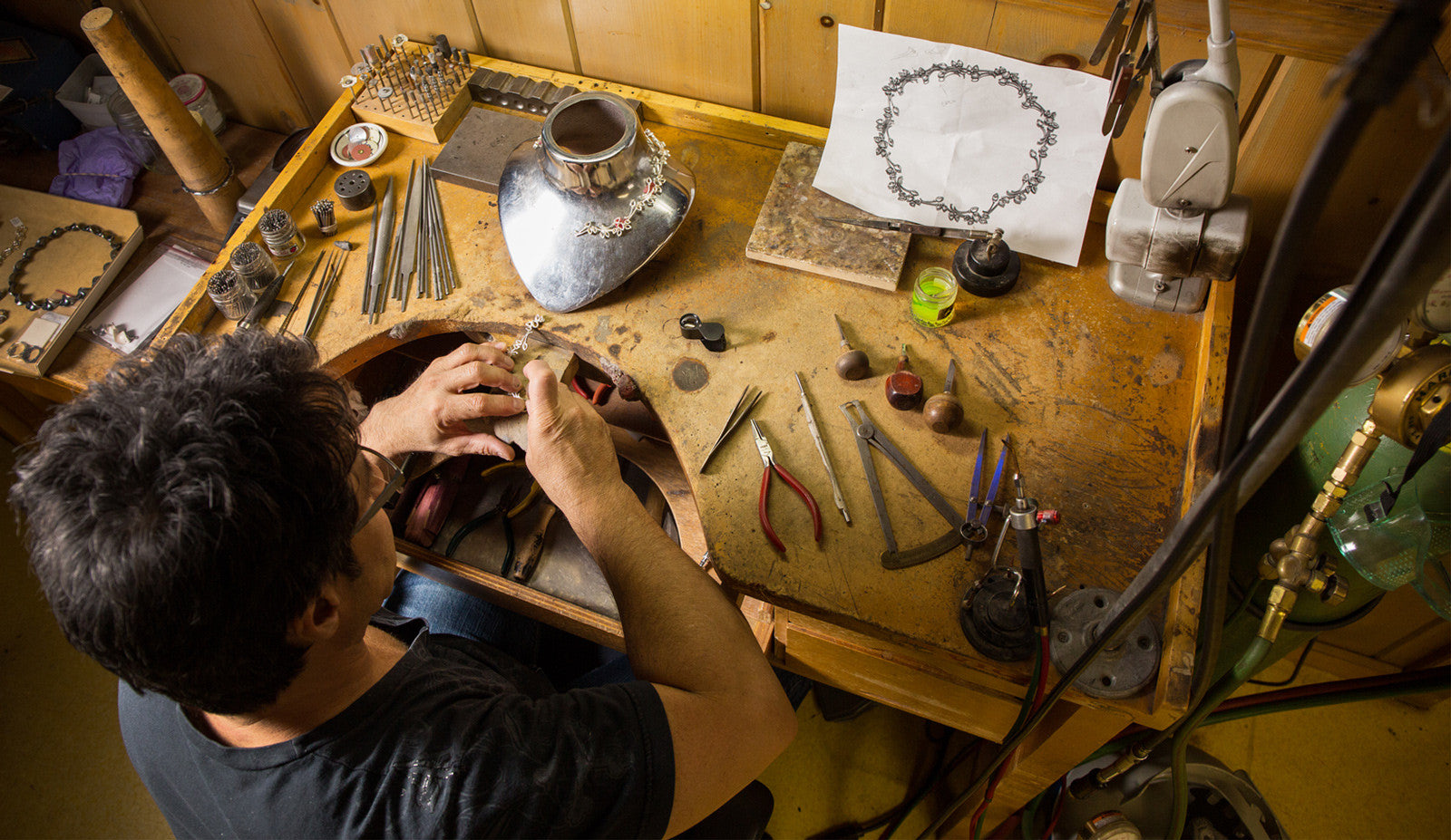 Diana Vincent Process showing jeweler at workbench