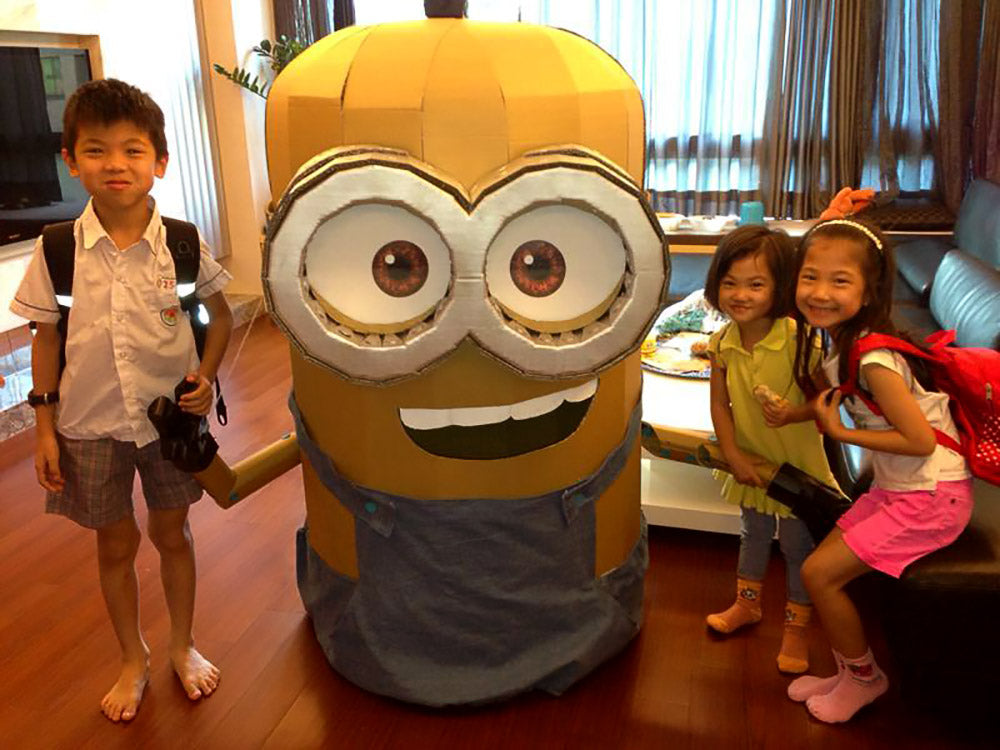 Makedo cardboard minion costume with kids