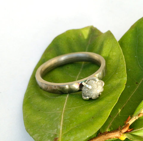 Titanium ring with rough diamond