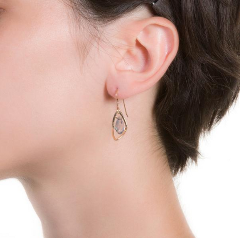 earrings on woman