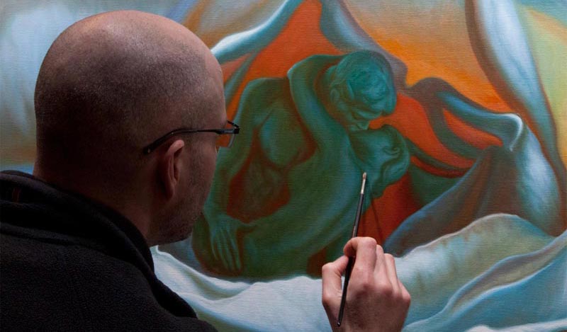 Vincent Keeling at the easel painting The Unfolding Kiss