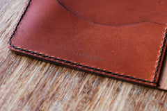 hand and hide leather tablet case detail shot hand stitching