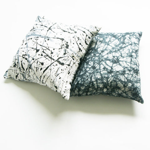 black and white splatter paint pillows