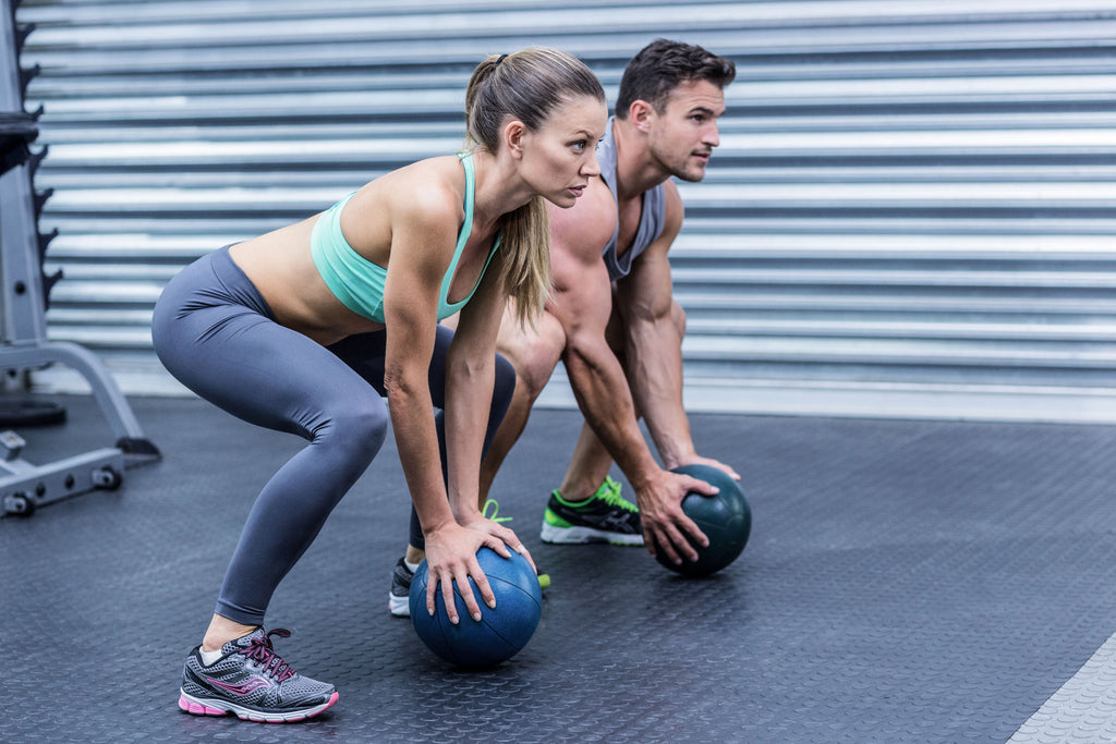 natural fat burners: 2 people working out