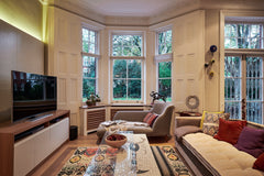 Living  with bespoke made TV cabinet, bespoke sofa and chaise longue