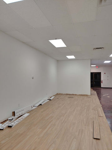 White ceiling, walls, wood flooring in progress