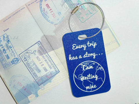 Every trip has a story - travel quote luggage tag - blue with white text