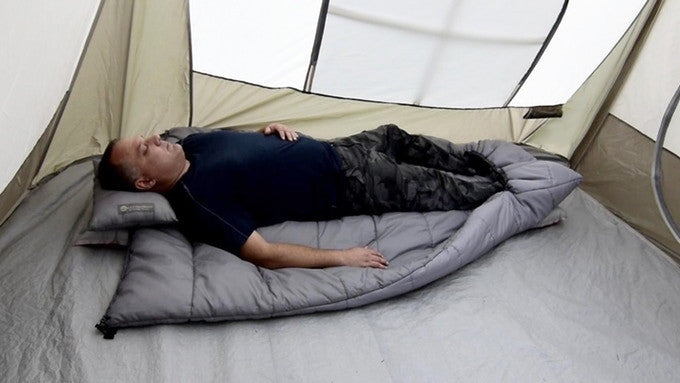 In warmer weather, you can sleep on top of the Adventure Top Quilt for extra cushioning
