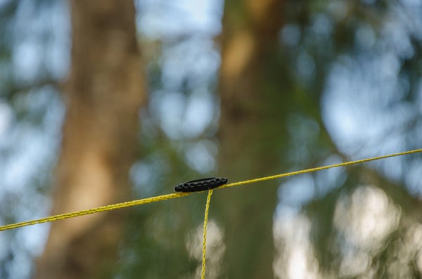 GO! Line shown with a Tactical Toggle Knot Replacement Device on Hammock Camping Tarp Ridgeline