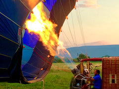 Pilot Firing Up the Hot Air Balloon Over Roussillon France