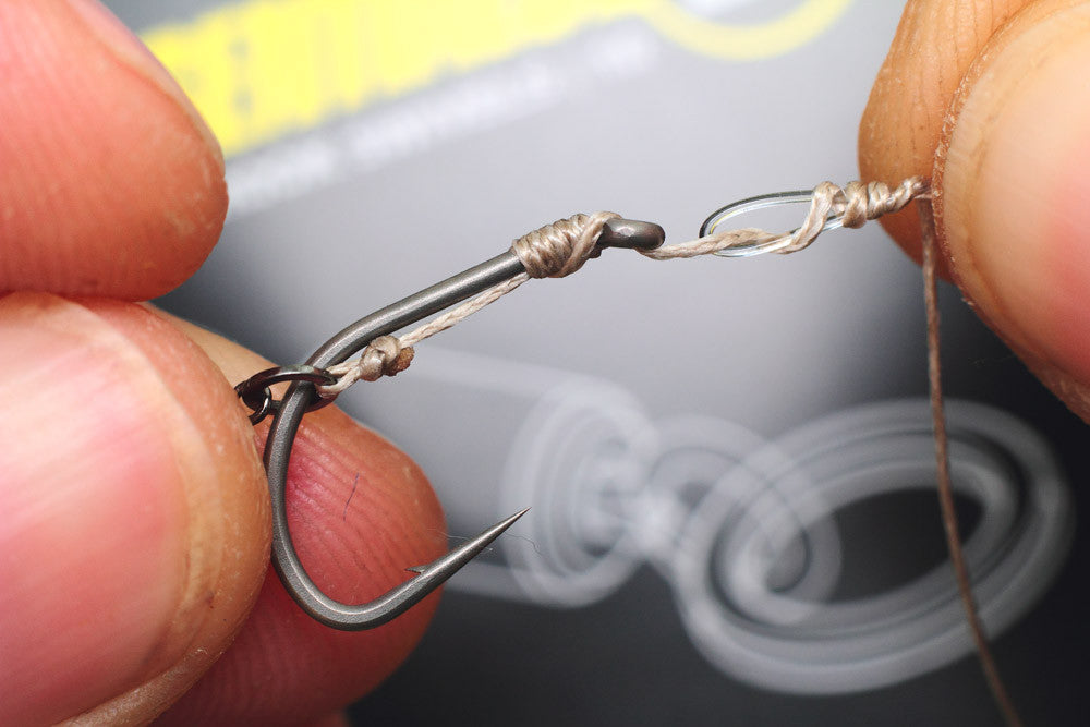 How to tie a Combi rig: Now whip the braid around the doubled over section of fluorocarbon, 5-7 turns will be fine