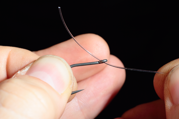 Pass your bristle filament through the eye of your Chod hook so that you have around 40mm at the back