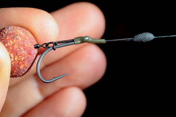 Our Transkhaki shrink tube prevents the "D" closing on the cast and doubles u nicely as a line aligner if you use the multi rig with a bottom bait