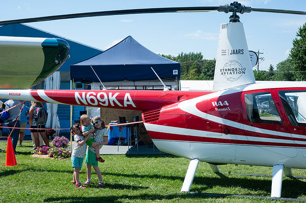 three girls by helicopter