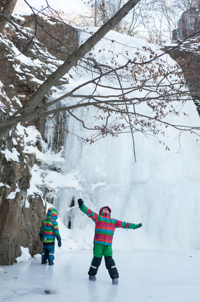 two children in front of frozen waterfall in NJ in Villervalla Winter Gear from US Biddleandbop.com