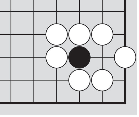 Dia. 4 - A portion of a Go board with 1 black stone and 6 white stones
