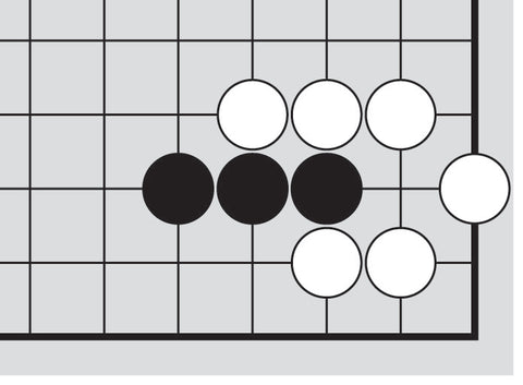 Dia. 5 - A portion of a Go board with 3 black stones and 6 white stones