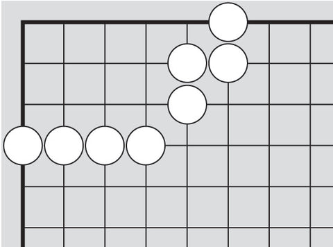 Dia. 1 - A portion of a Go board with 8 white stones