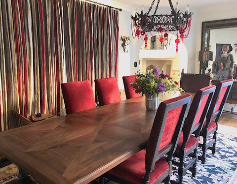 spanish custom upholstered dining chairs in red velvet, made in Los Angeles