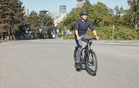 Man smiling on an e-bike