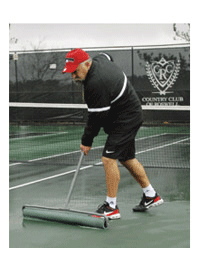 Miracle Sweep removing water from tennis court.