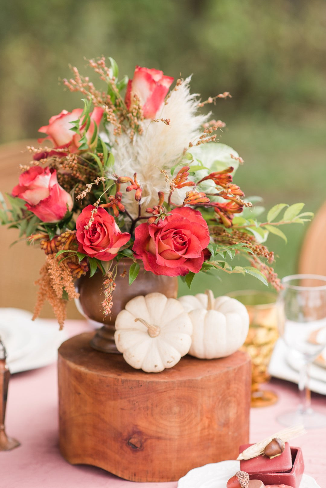 Flowers and pumpkins at a fall wedding