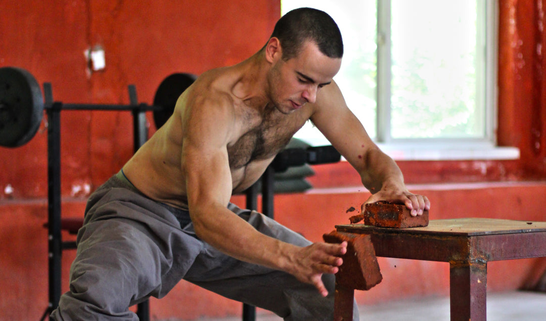 Alex Corne, Armadillo Merino® Champion and Shaolin Kung Fu Expert, brick breaker