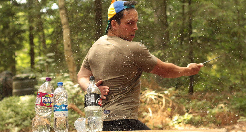 Maarten slicing water bottles