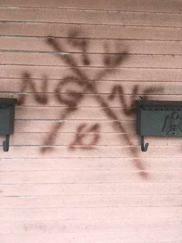A Search Code, also known as X-Codes or Katrina Crosses, marked on the side of Sylvia’s home.