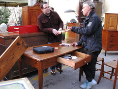 Massimo negotiates at the Lucca Market