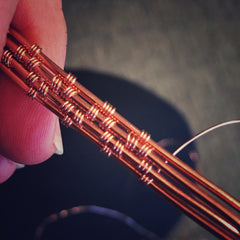 Handmade tie tack tie bar men's jewelry. Wire wrapped wire weaving in copper jewelry wire work.