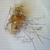 handmade jewelry wire weave pendant sketches show design in gold, copper, silver, gems