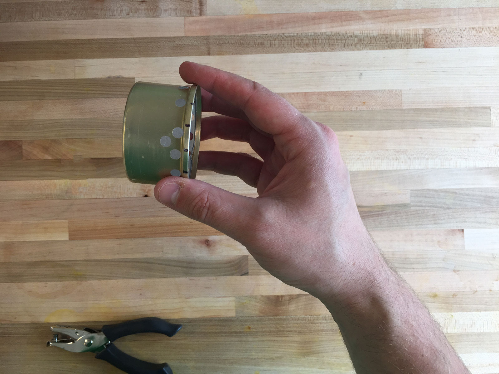 How to Make a Backpacking Stove with a Cat Food Can and a Hole Punch