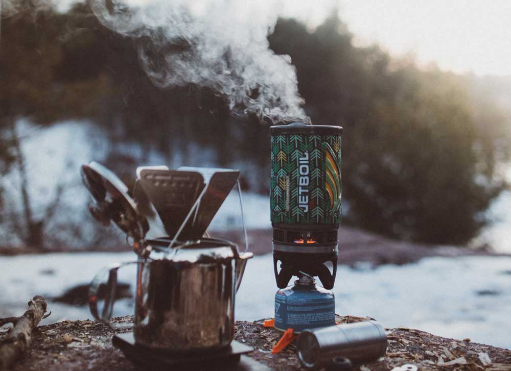 GSI Java drip being used to make coffee with backpacking stove.