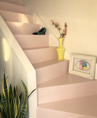 Finished pastel pink painted staircase.