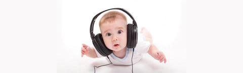 Kid wearing large headphones