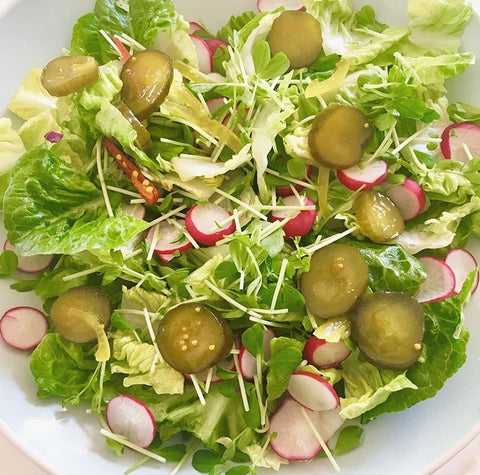 fresh radish sprouts and picked cucumber salad