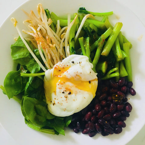 Green bowl with black beans