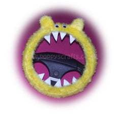 Fuzzy faux fur Yellow Monster steering wheel cover with googly eyes, ears, and teeth - Poppys Crafts