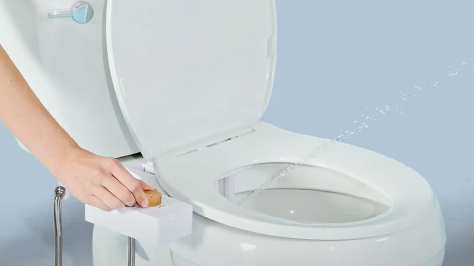 Tushy bidet attachment spraying water