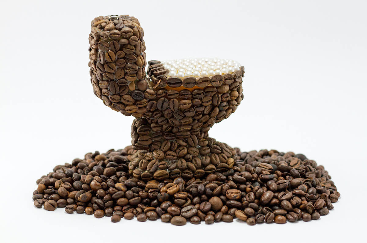 Why Does Coffee Make You Poop?, toilet made of coffee beans.