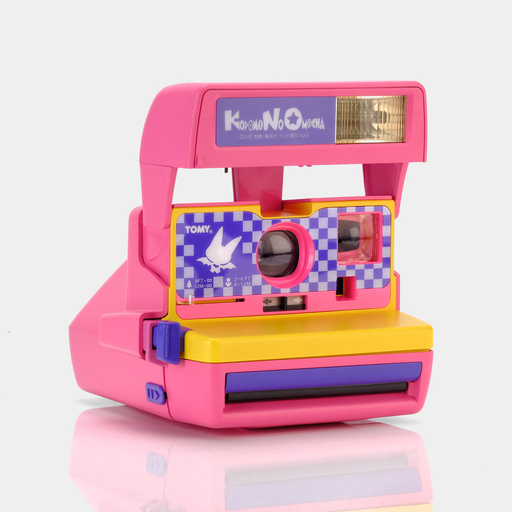 vintage pink polaroid camera