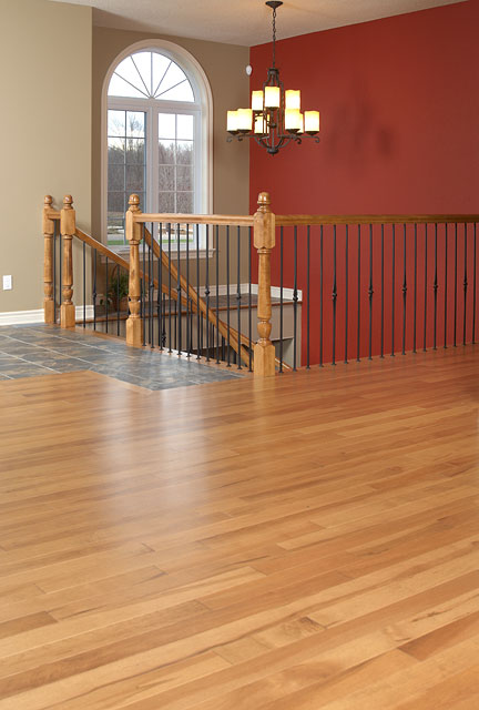 Maple antique wood flooring in a medium tone