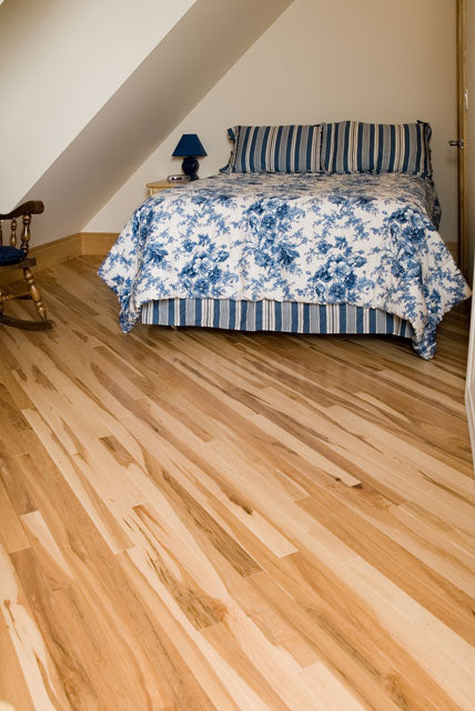 rustic maple wood flooring in a bedroom setting